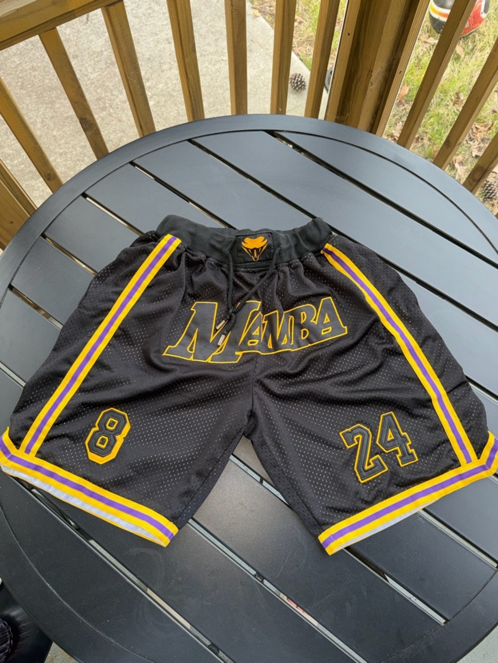 Mamba Kobe Bryant Los Angeles Lakers basketball shorts.